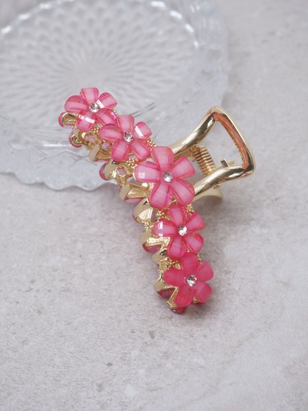 Hovedbilde Hårklype med blomstersteiner fuksia