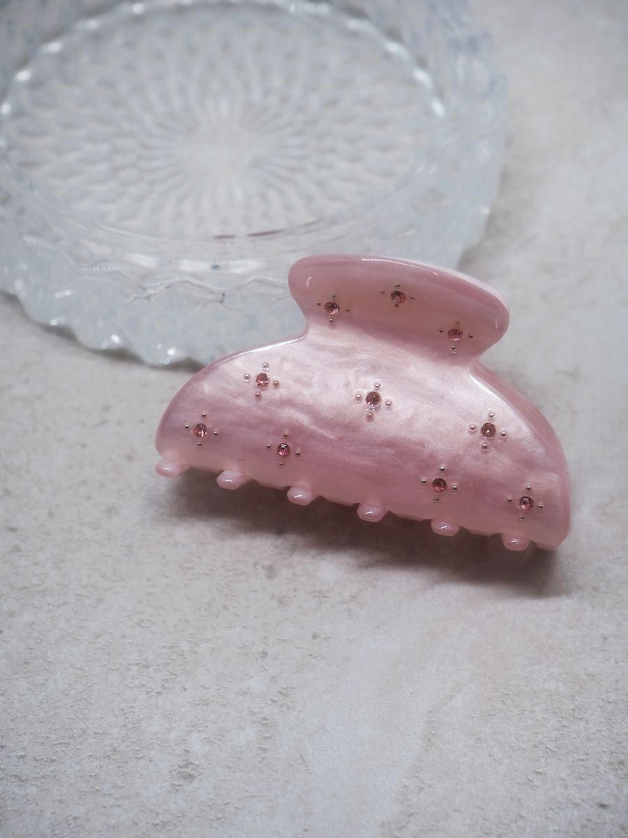 Hårklype med små perleblomster lyserosa