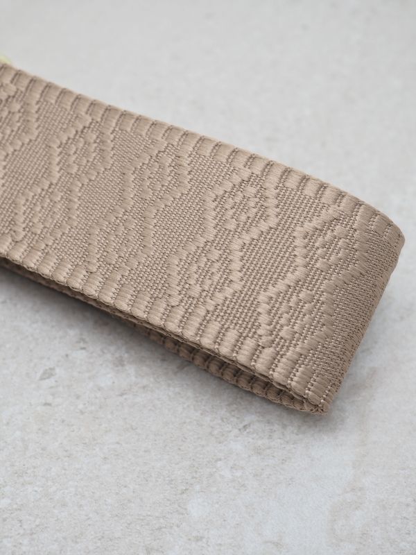Veskestropp skinndetaljer lyse taupe