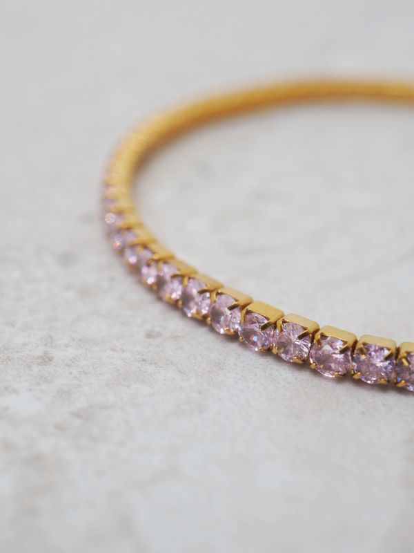 Tennisarmbånd strikk rosa