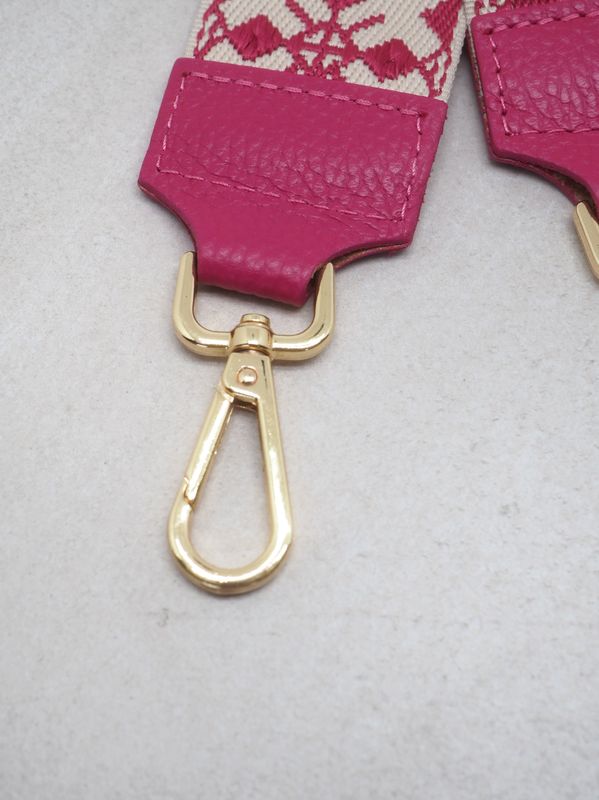 Veskestropp skinndetaljer fuksia