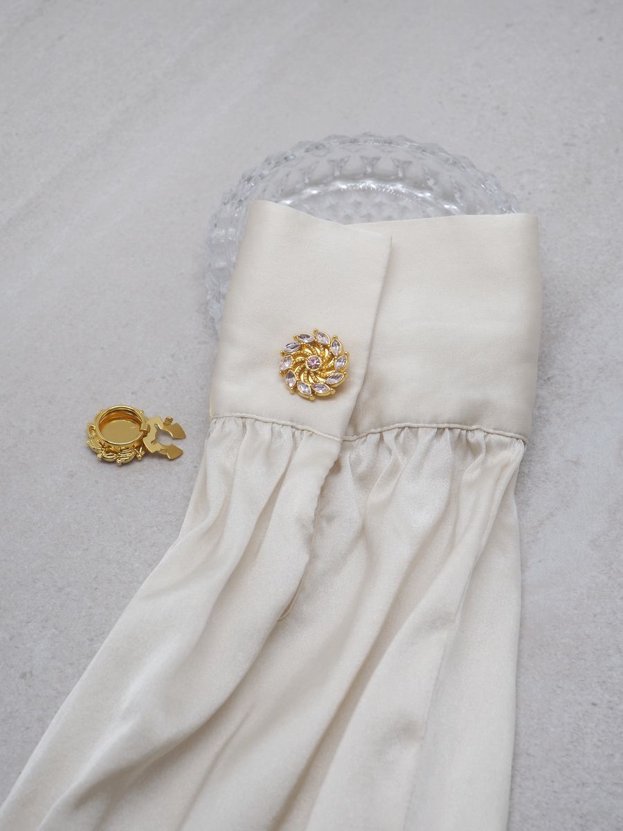 Knappepynt 2stk. gullfarget spinner rosa steiner