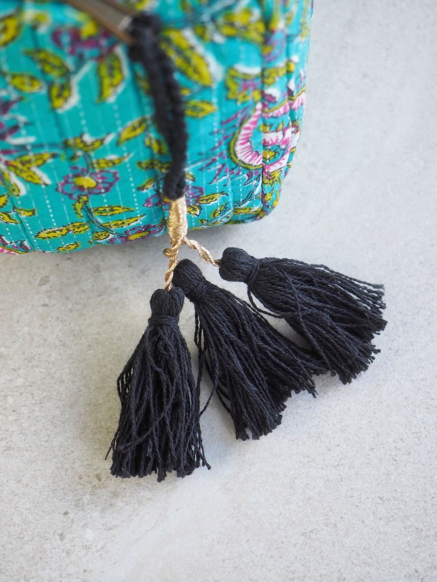 Toalettmappe med mønster turkis